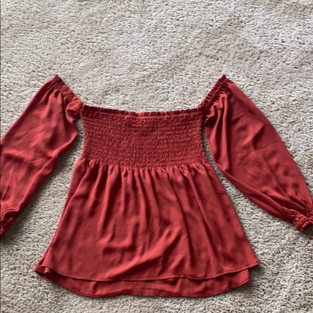 Off the should rust colored top